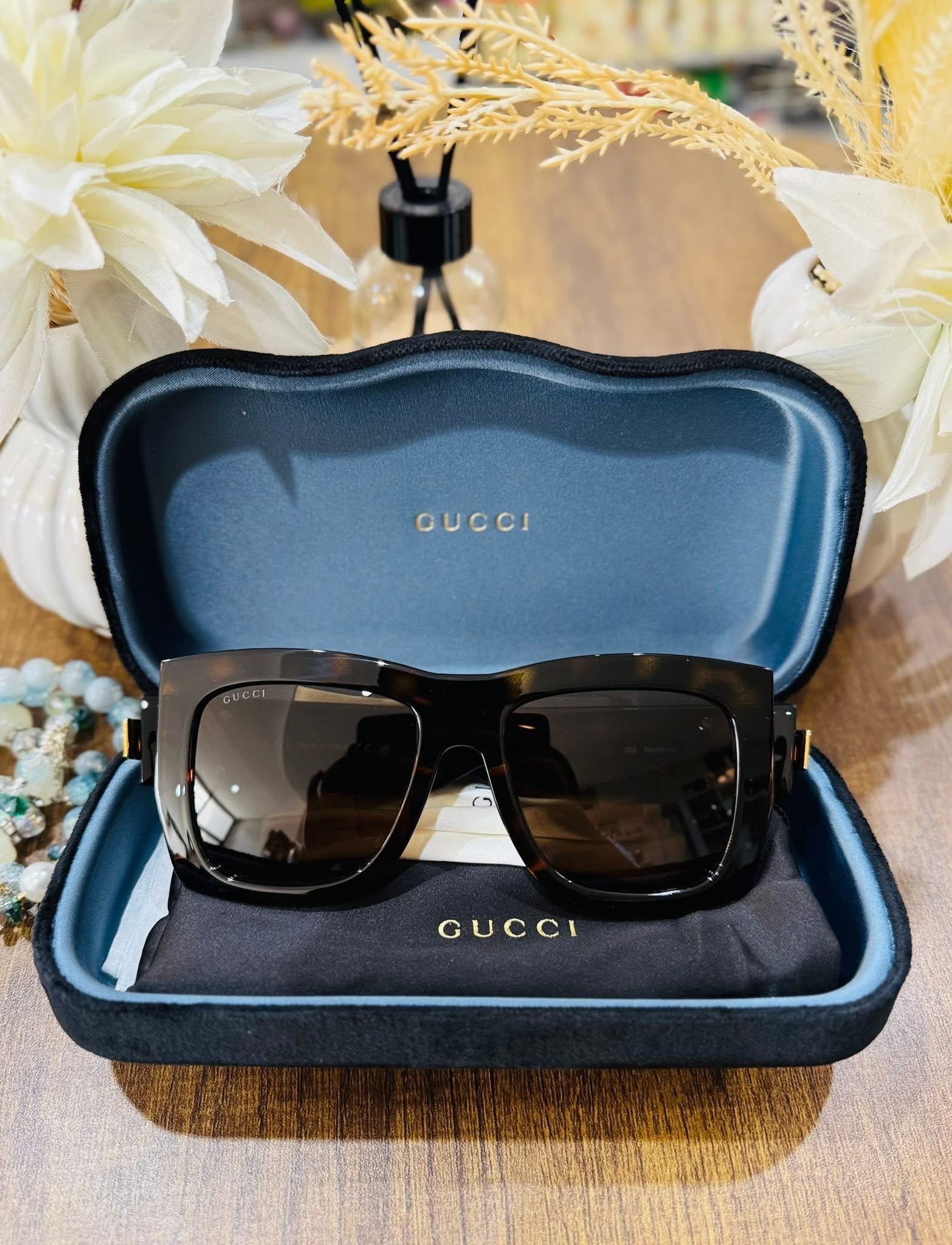 MAY Kaya Gucci black oversized square sunglasses in blue case