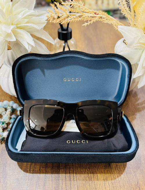 MAY Kaya Gucci black oversized square sunglasses in blue case