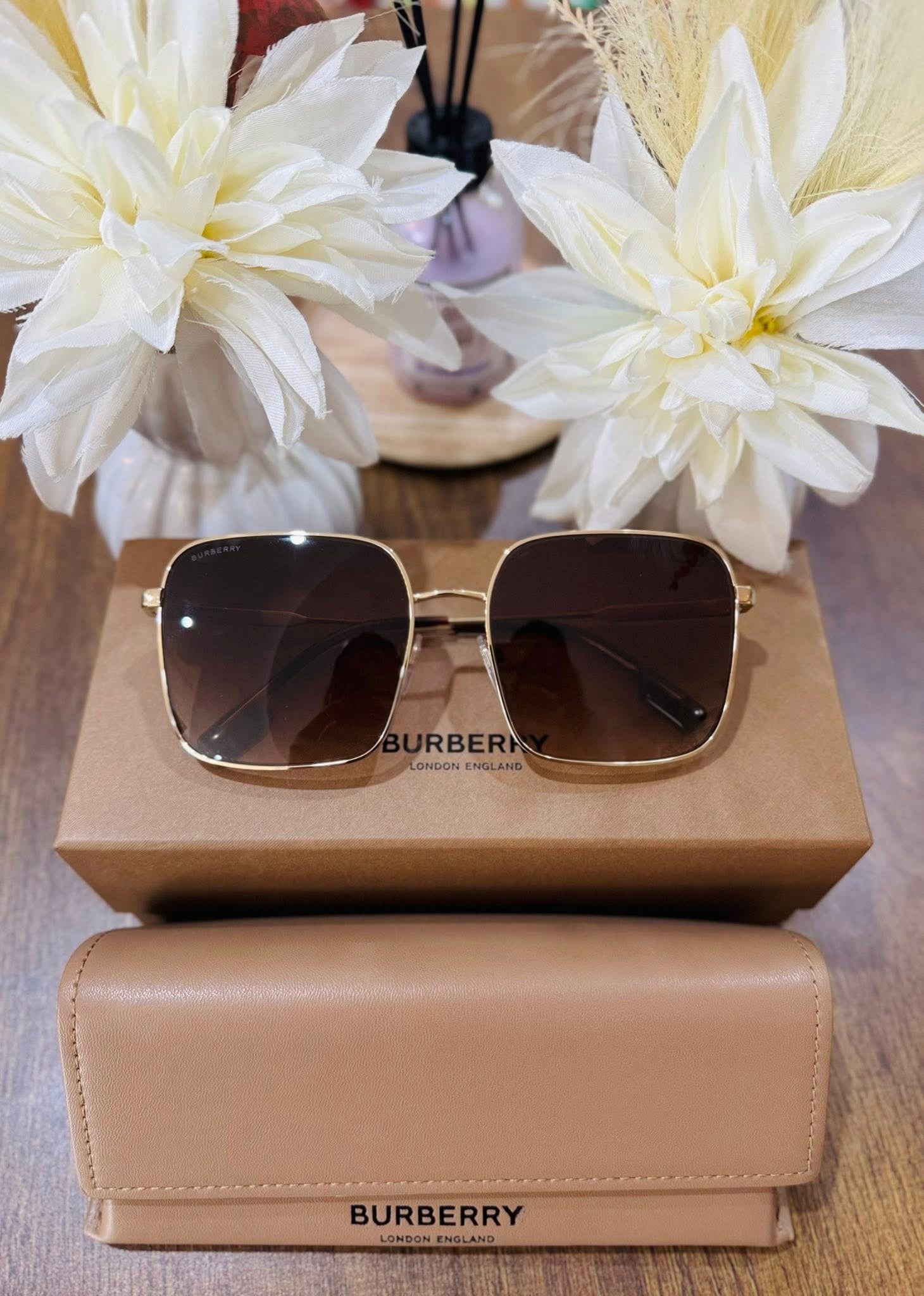 MAY Kaya Burberry brown square sunglasses with gold-tone frame and tan case