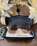 MAY Kaya Gucci brown rimless / aviator-style sunglasses