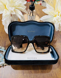 MAY Kaya Gucci black/brown square sunglasses in blue case