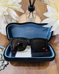 MAY Kaya Gucci black rectangular sunglasses in blue case