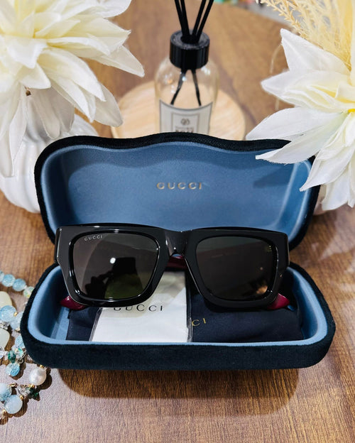 MAY Kaya Gucci black rectangular sunglasses in blue case